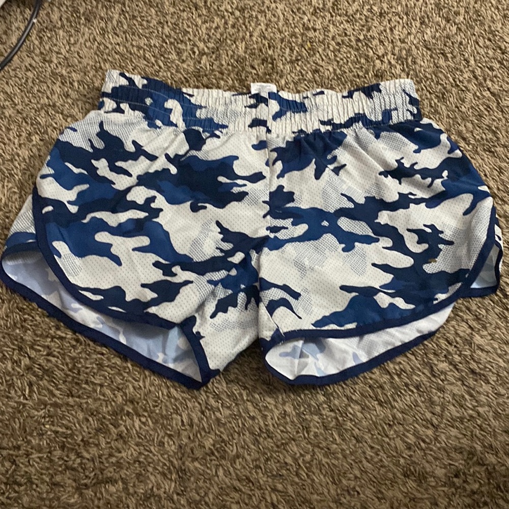 It is a pair of blue and white camo shorts with built in panties